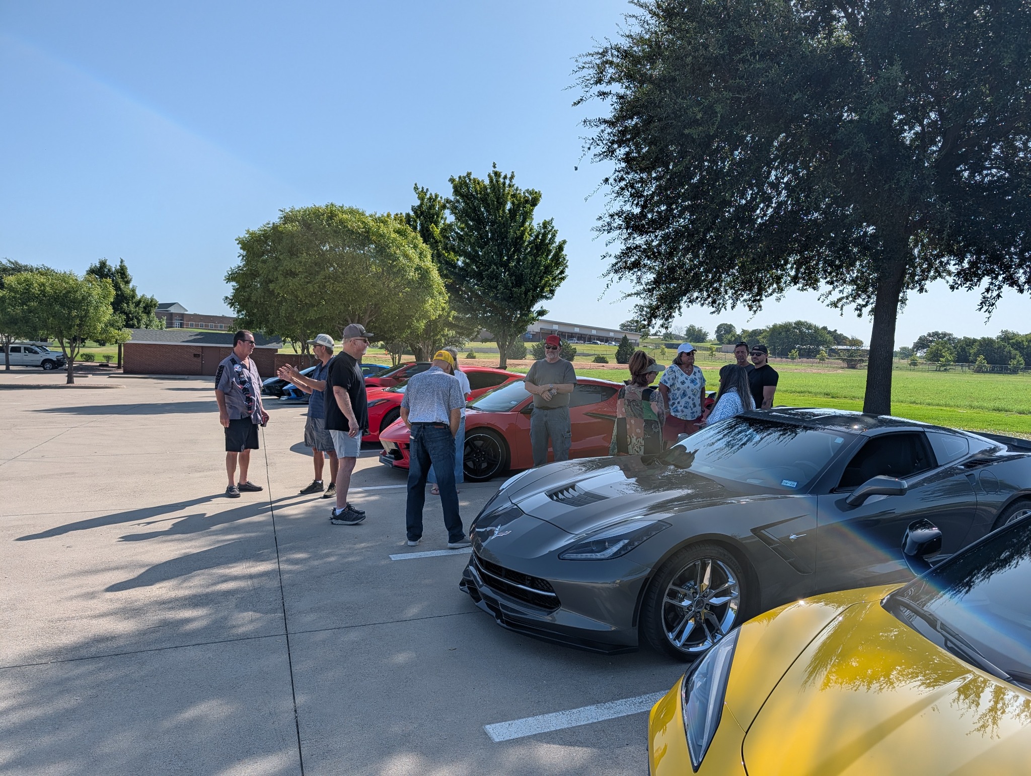 Parker County Corvettes members gathered with Corvettes